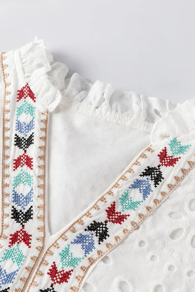 Bluse mit v-ausschnitt, entspannter passform und eleganten details für damen