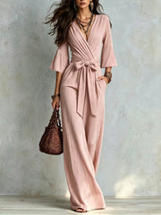 Damen Jumpsuit Wickel-Optik mit weitem Bein, Taillengürtel und Glockenärmeln Nord Taschen – Rosa
