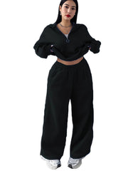 Damen Cropped Oversize-Sweatshirt mit halbem Reißverschluss und weite High-Waist Jogginghose Set Nord Taschen – Schwarz - Tagesversand