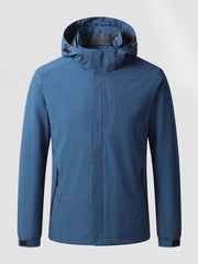 Herren Atmungsaktive Softshell Funktionsjacke mit Verstaubarem Kapuze und Klettverschluss-Manschetten Nord Taschen – Jeans blau Herren