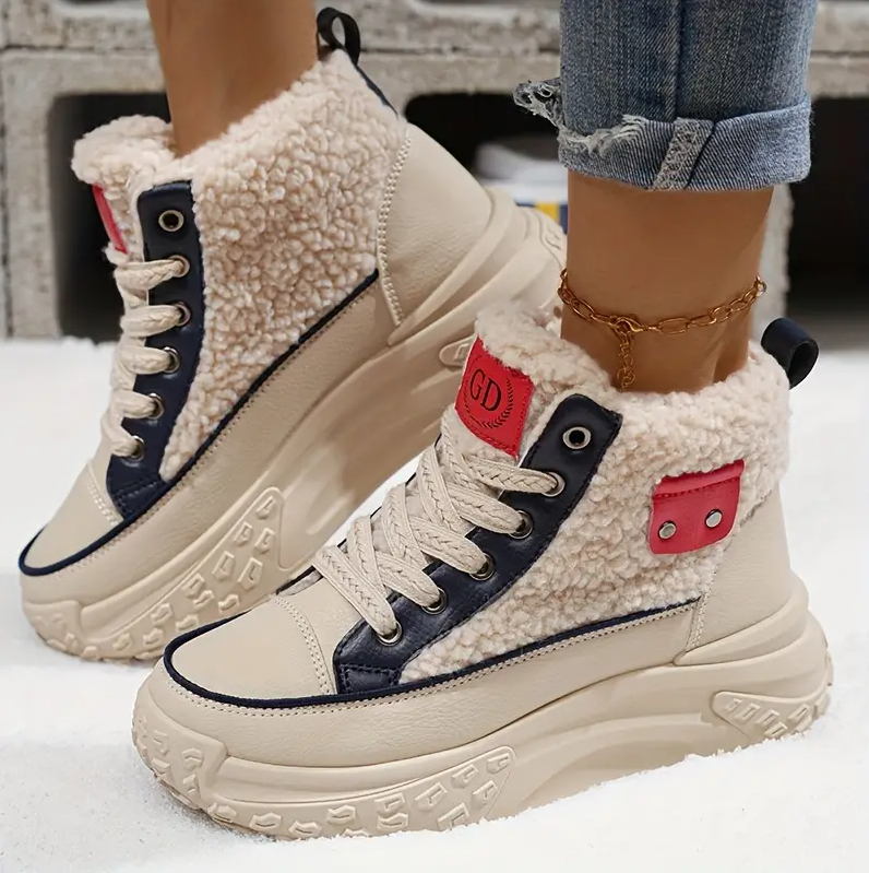 Gemütlich – mit fleece gefütterte schneestiefel für den lässigen winterstil für damen