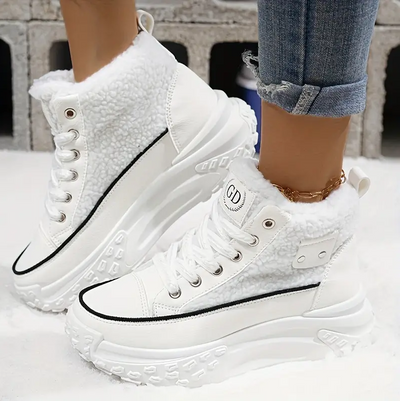 Gemütlich – mit fleece gefütterte schneestiefel für den lässigen winterstil für damen