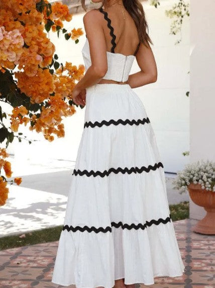 Ibrahimu – schlichtes crop-top mit wellenförmigem design und mehrlagigem rock-set