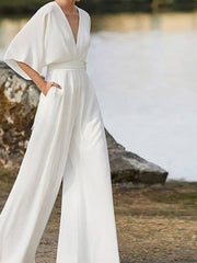 Damen-Jumpsuit mit V-Ausschnitt aus Baumwollmischung – Weiß